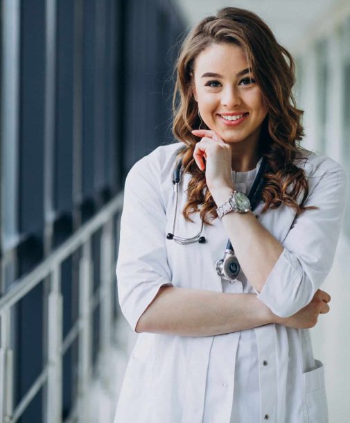 Young woman doctor with stethoscope at hospital